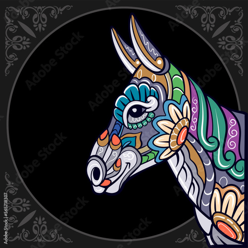 Colorful donkey head mandala arts isolated on black background