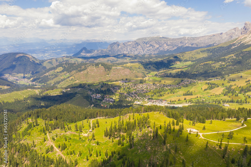 Drone photography of mountain range, meadows and forest