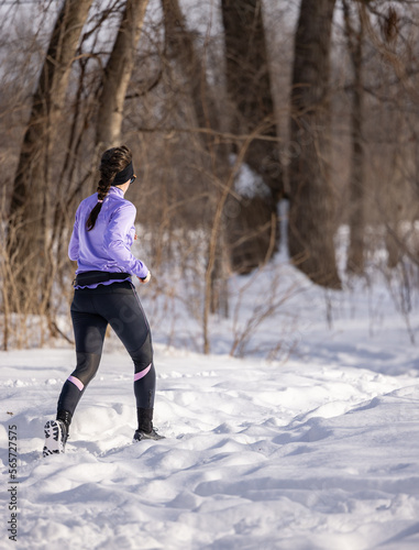 Woman running on snow