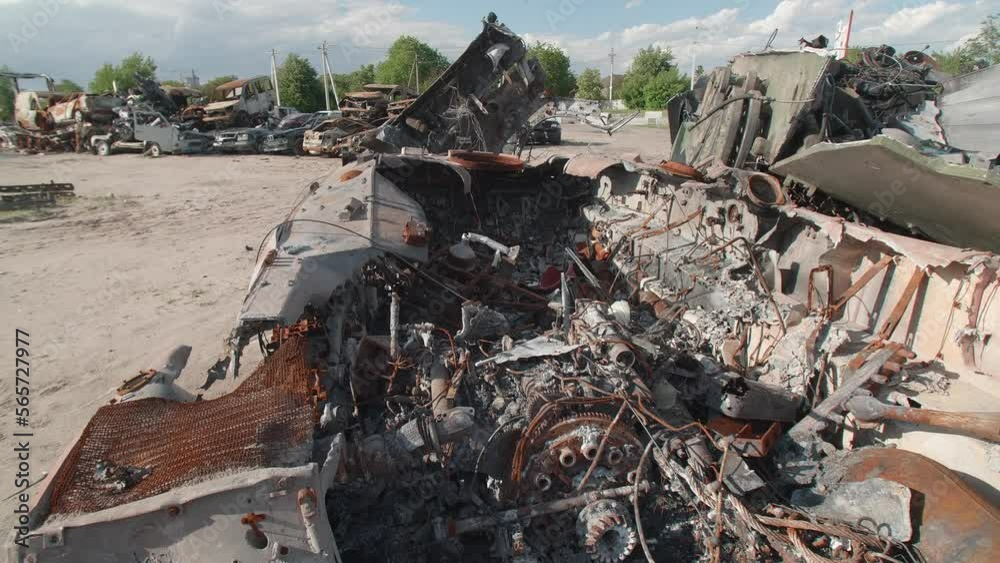 March, 2022. Bucha, Ukraine. War and terror background for motion wallpaper. Devastated blown-up private vehicles of killed Ukrainian people after Russian invasion. High quality 4k footage March, 2022. Bucha, Ukraine. War and terror background for motion wallpaper. Devastated blown-up private vehicles of killed Ukrainian people after Russian invasion. High quality 4k footage