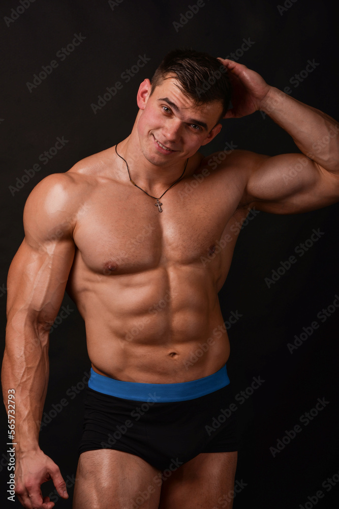 Fitness Inspiration: Muscled Man Showcases Toned Body in Studio Fitness Inspiration: Muscled Man Showcases Toned Body in Studio