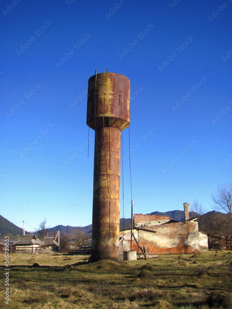 An old water tower at an abandoned factory
