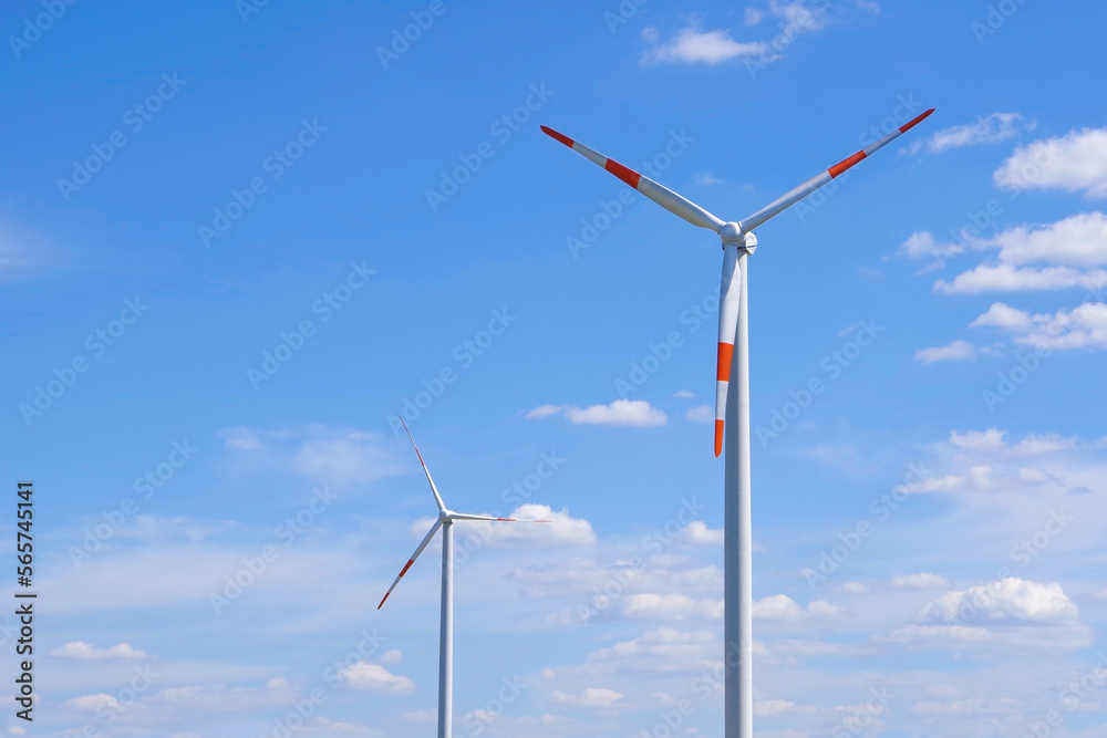 Wind turbines against the blue sky. Alternative energy. Wind turbines against the blue sky. Alternative energy.