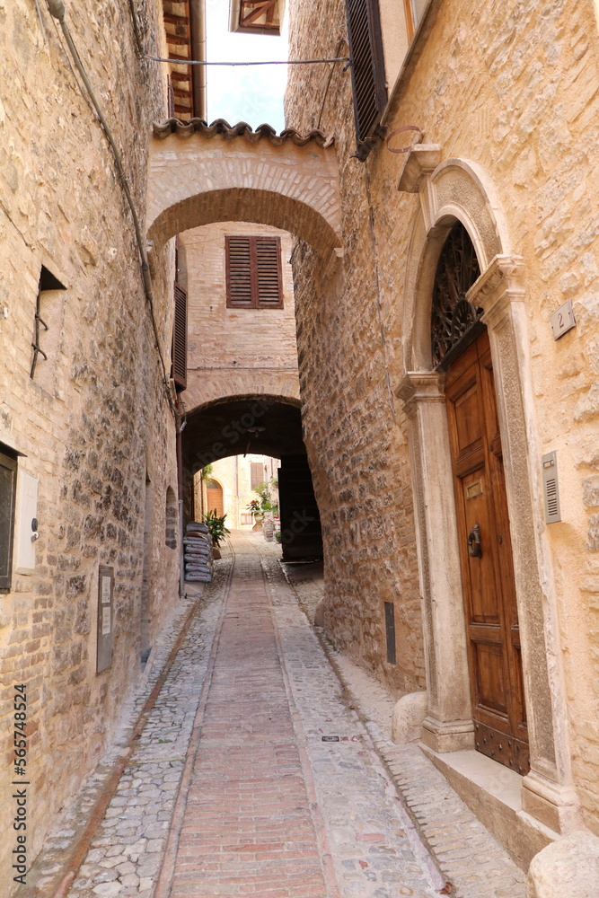 Archway in a old narrow alley in Spello, Umbria Italy