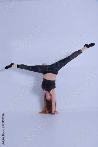 young woman with long hair doing gymnastics poses
