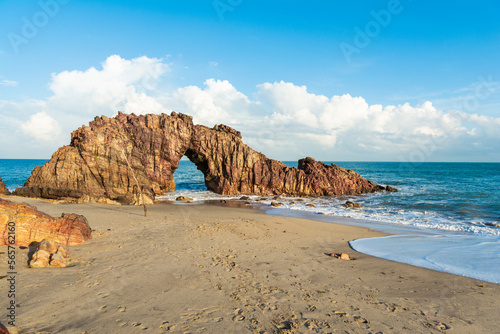 Pedra Furada. Famous touristic attraction on the beach of Jericoacoara, Ceara State, Brazil. photo