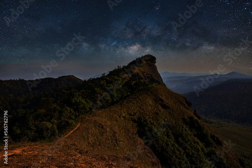 The bright stars of the Milky Way in the night sky over and stars at doi mon jong , Chiang Mai , Thailand