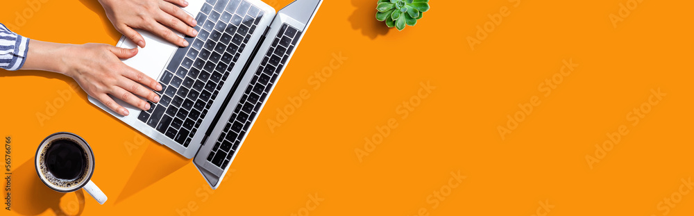 Person using a laptop computer Person using a laptop computer