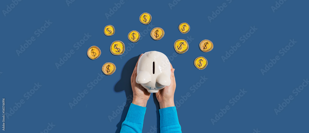 Person holding piggy bank with hand drawn coins