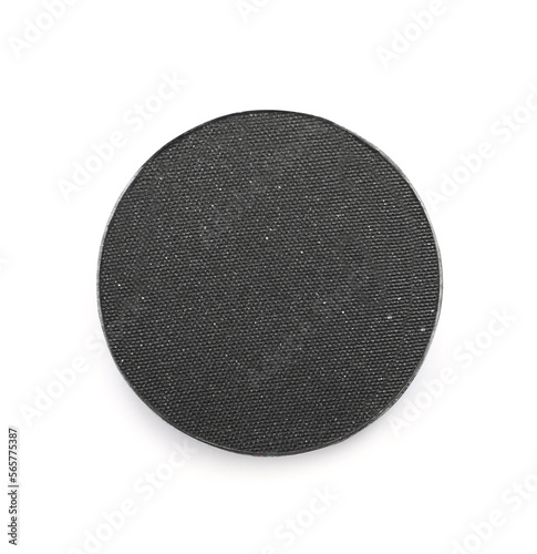 Black eye shadow on white background, top view. Decorative cosmetics