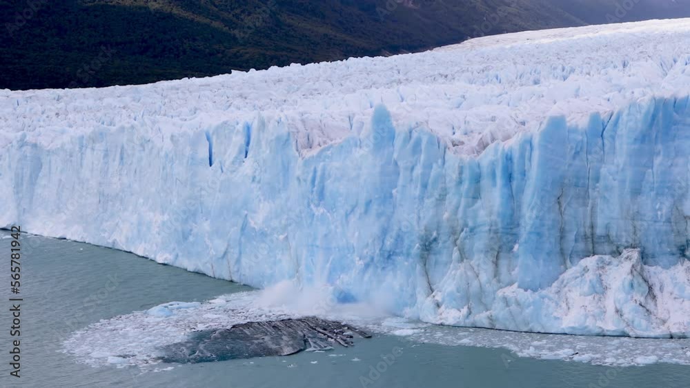 High angle view of a chunk of ice from a collapsing glacier. Consequence of climate change.
