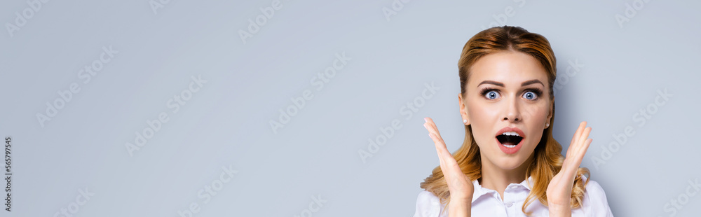 Wow. Face portrait image excited surprised, shocked happy business woman with wide open mouth and eyes, raised up hands. Unbelievable sales offers, incredible, win shock expression concept. Grey. Wow. Face portrait image excited surprised, shocked happy business woman with wide open mouth and eyes, raised up hands. Unbelievable sales offers, incredible, win shock expression concept. Grey.