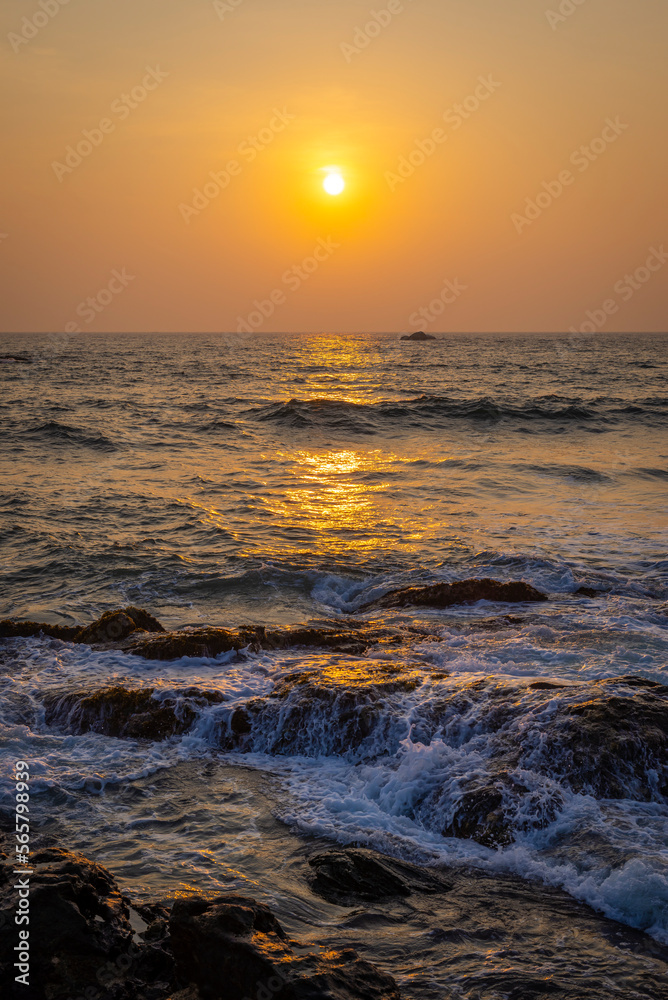 Setting sun on beach in Sri Lanka