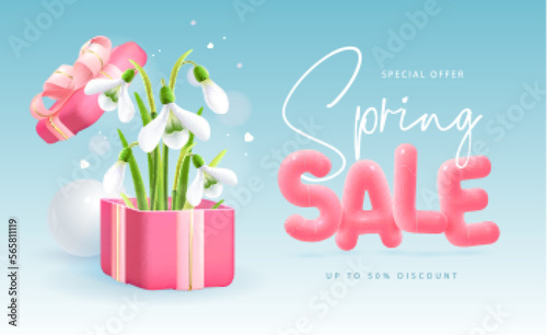 Spring big sale poster with realistic full blossom snowdrops, gift box and 3d text on blue background. Vector illustration