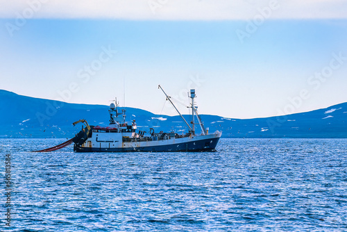 Tableau sur toile Fishing boat trawling for shrimp at Svalbard