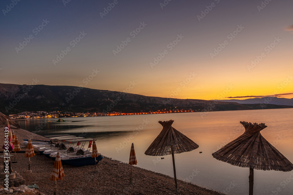 Fototapeta premium sunset on the beach sunset over the sea sunset over the lake sunset over the river Croatia Baška sunset on the coast lake and mountains Croatia Baška mountain Croatia Baška sea Croatia Baška