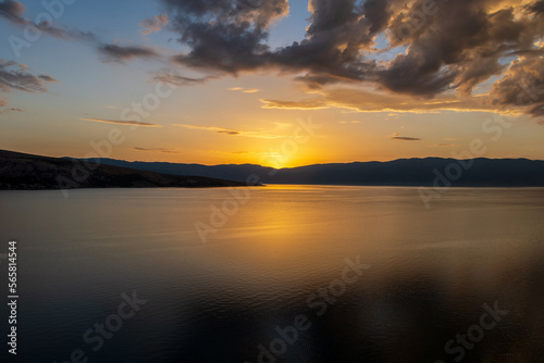 sunset over the lake sunset over the river Croatia Baška sunset on the coast lake and mountains Croatia Baška mountain Croatia Baška sea Croatia Baška