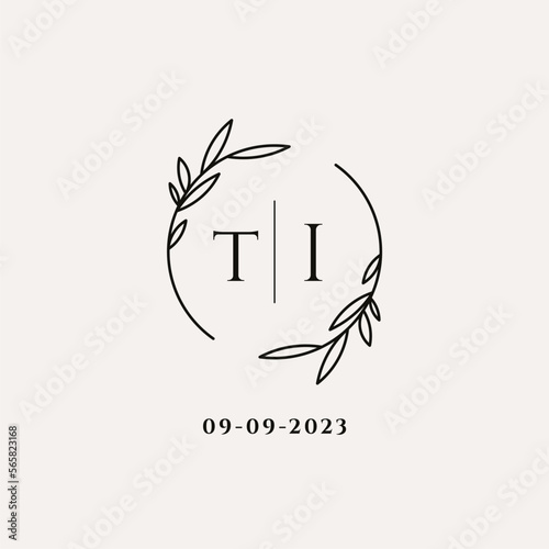 Letter TI wedding monogram logo design with simple natural circle leaf frame