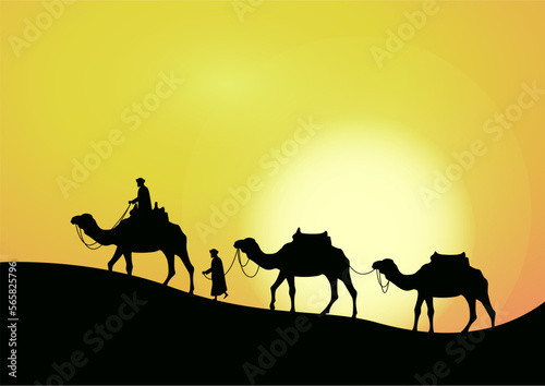 camel caravan going through the desert on beautiful sunset background