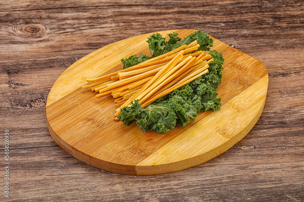 Chechel cheese sticks over board