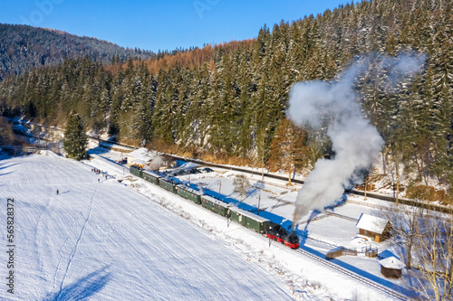Pressnitztalbahn steam train locomotive railway aerial view in winter in Schmalzgrube, Germany