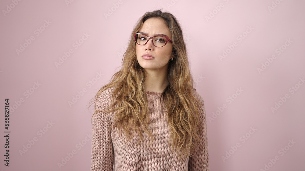 Young beautiful hispanic woman standing with relaxed expression over isolated pink background Young beautiful hispanic woman standing with relaxed expression over isolated pink background