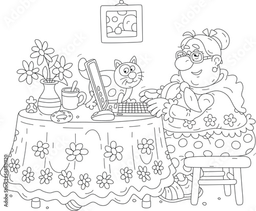 Funny chubby granny and her merry cat sitting at their beautiful kitchen table with a laptop, browsing pages on Internet and chatting with friends in social networks and messengers