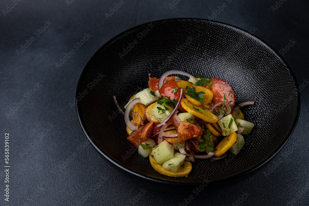 a delicious salad on a plate prepared in a restaurant.
a delicious salad on a plate prepared in a restaurant.