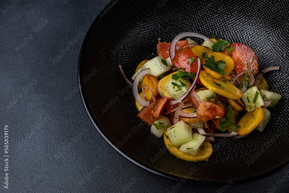 a delicious salad on a plate prepared in a restaurant.
a delicious salad on a plate prepared in a restaurant.