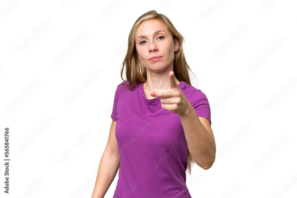 Young blonde woman over isolated background frustrated and pointing to the front Young blonde woman over isolated background frustrated and pointing to the front
