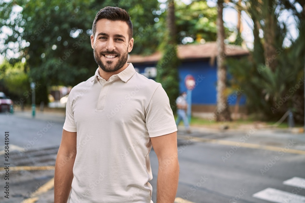 Young hispanic man smiling confident walking at street Young hispanic man smiling confident walking at street