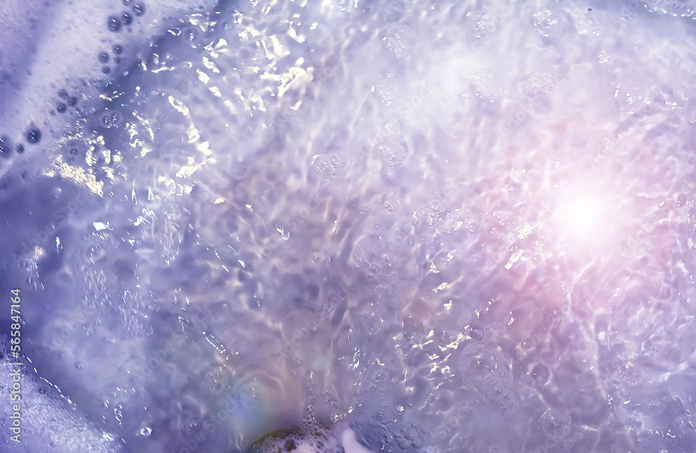 Fototapeta premium foam blue texture soap bubbles on the water abstract background