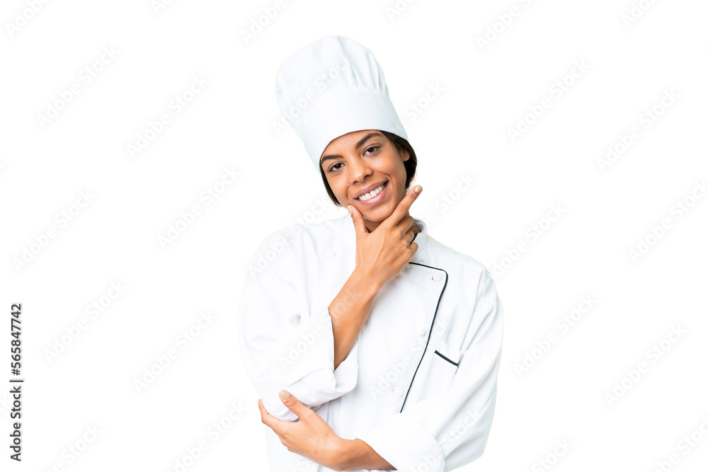 Young African American chef over isolated chroma key background smiling Young African American chef over isolated chroma key background smiling