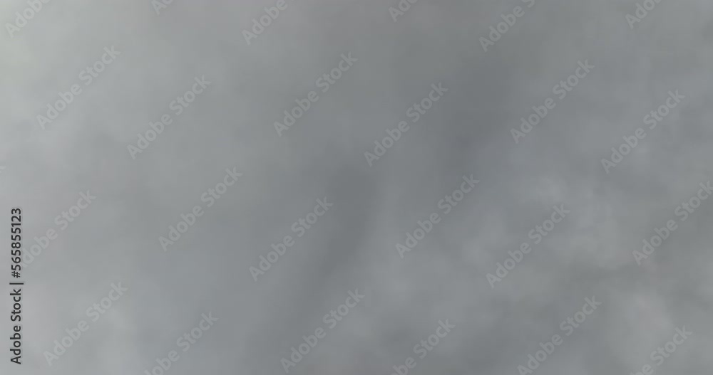 Aerial View. Flying over the high mountains in beautiful clouds. Aerial Drone camera shot. Air pollution clouds over Sarajevo in Bosnia and Herzegovina. Aerial View. Flying over the high mountains in beautiful clouds. Aerial Drone camera shot. Air pollution clouds over Sarajevo in Bosnia and Herzegovina.
