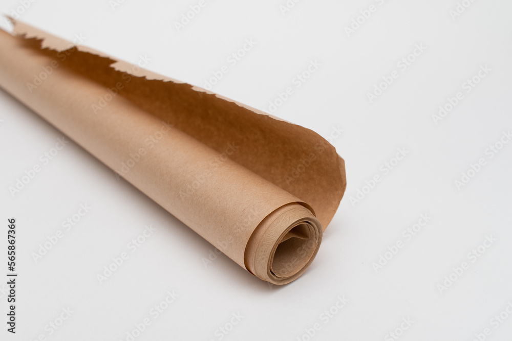 Baking paper roll on a white background Baking paper roll on a white background