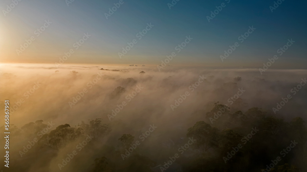Arial photo of a foggy morning at sunrise