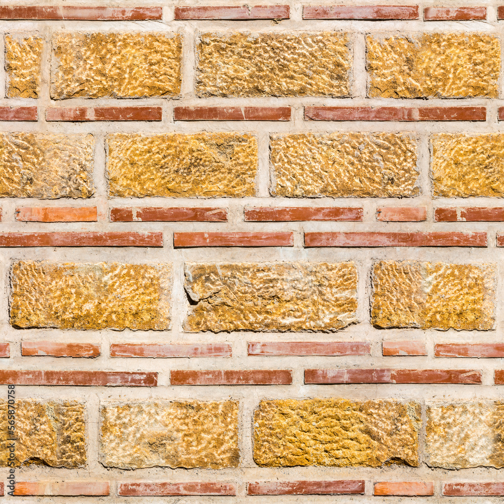 Background, seamless texture of yellow sandstone wall