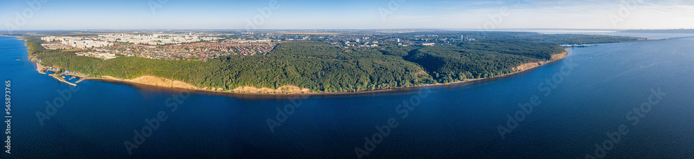 Ulyanovsk, Zavolzhsky district - coastal forest and residential development. View from the Volga river. Aerial view.