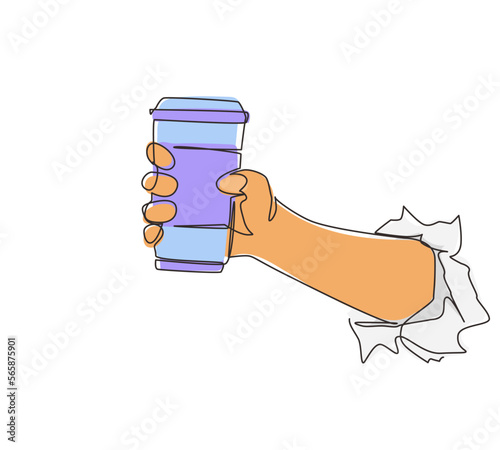 Continuous one line drawing hand holding disposable paper black coffee cup through torn white paper. Energy boost, hot drink in take-away package. Single line draw design vector graphic illustration