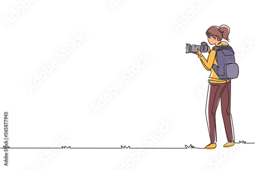 Single continuous line drawing woman photographer with backpack holding photo camera. Journalist making nature shooting on mountain. Female character. One line draw graphic design vector illustration