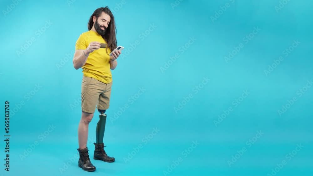 Studio portrait of a man with prosthesis on his leg Studio portrait of a man with prosthesis on his leg