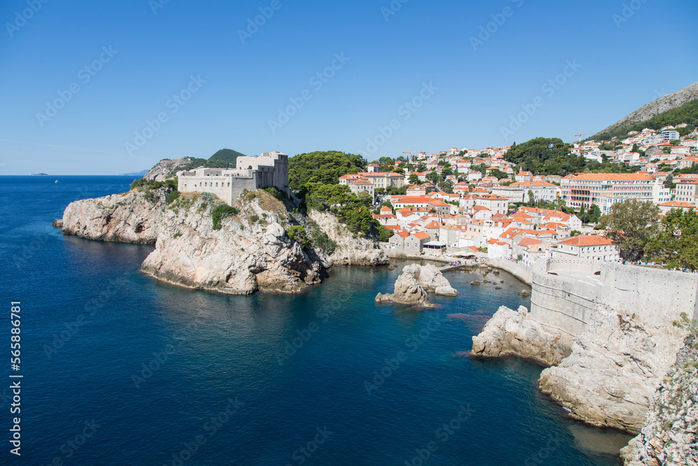 Panorama view to ancient Fort Livrijenac at the west harbor and famous bay known as film location - on a walk along the impressive and famous wall of Dubrovnik, Croatia