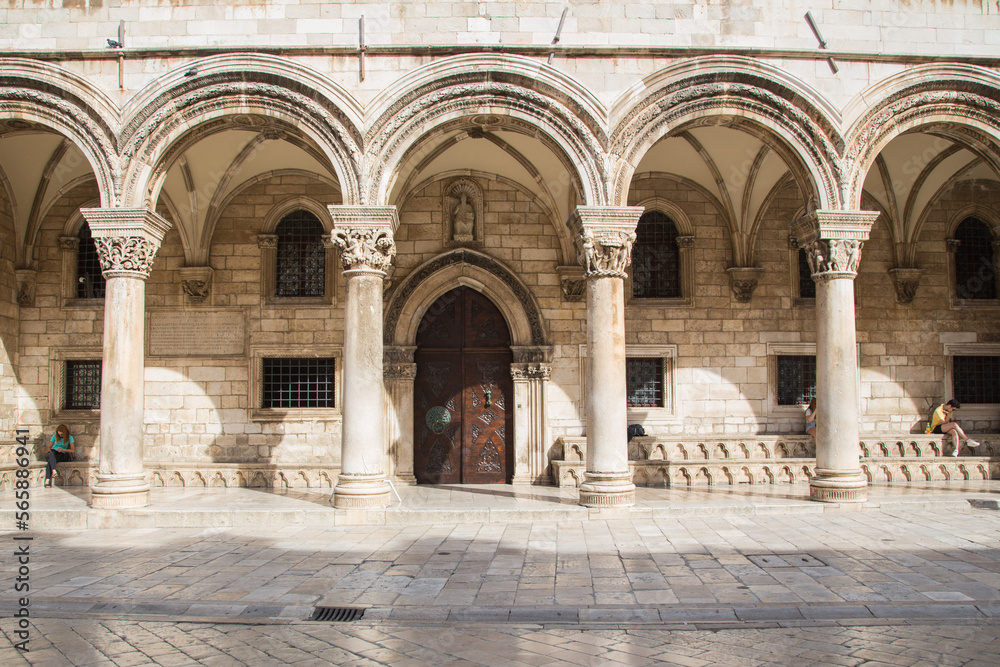 The gothic Renaissance palace called Rector Palace - now a history museum - with its round arches in a main street made of limestone, Dubrovnik, Croatia The gothic Renaissance palace called Rector Palace - now a history museum - with its round arches in a main street made of limestone, Dubrovnik, Croatia