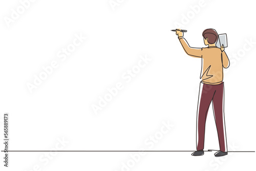 Single continuous line drawing business school professor teaching explaining and writing formula on chalkboard. Business man teacher standing at class. One line draw design graphic vector illustration