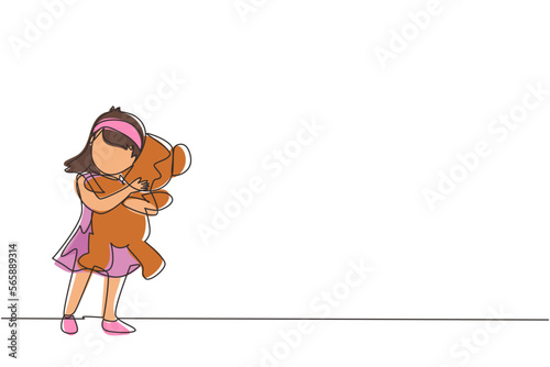 Single one line drawing cute little girl standing and hugging teddy bear. Portrait of expressive kid hugging her plush bear friend. Little girl playing. Continuous line draw design vector illustration