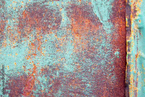 Oxide steel texture for background. Rusty metal panel with streaks of rust. Corrosive and oxidizer board for design. 