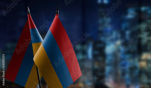 Small flags of the Armenia on an abstract blurry background