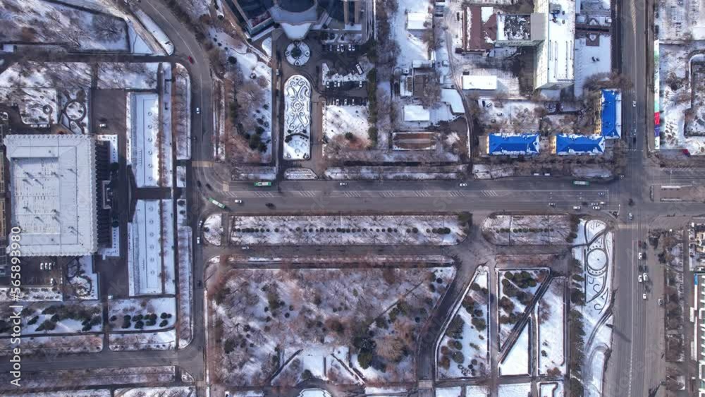 This drone video showcases a bustling street from a bird's eye view. The drone effortlessly glides over the busy street, capturing the energy and movement of the city below This drone video showcases a bustling street from a bird's eye view. The drone effortlessly glides over the busy street, capturing the energy and movement of the city below
