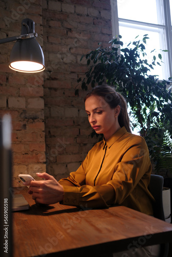 Workspace with laptop, girl working on laptop. Office table desk. Freelancer working place