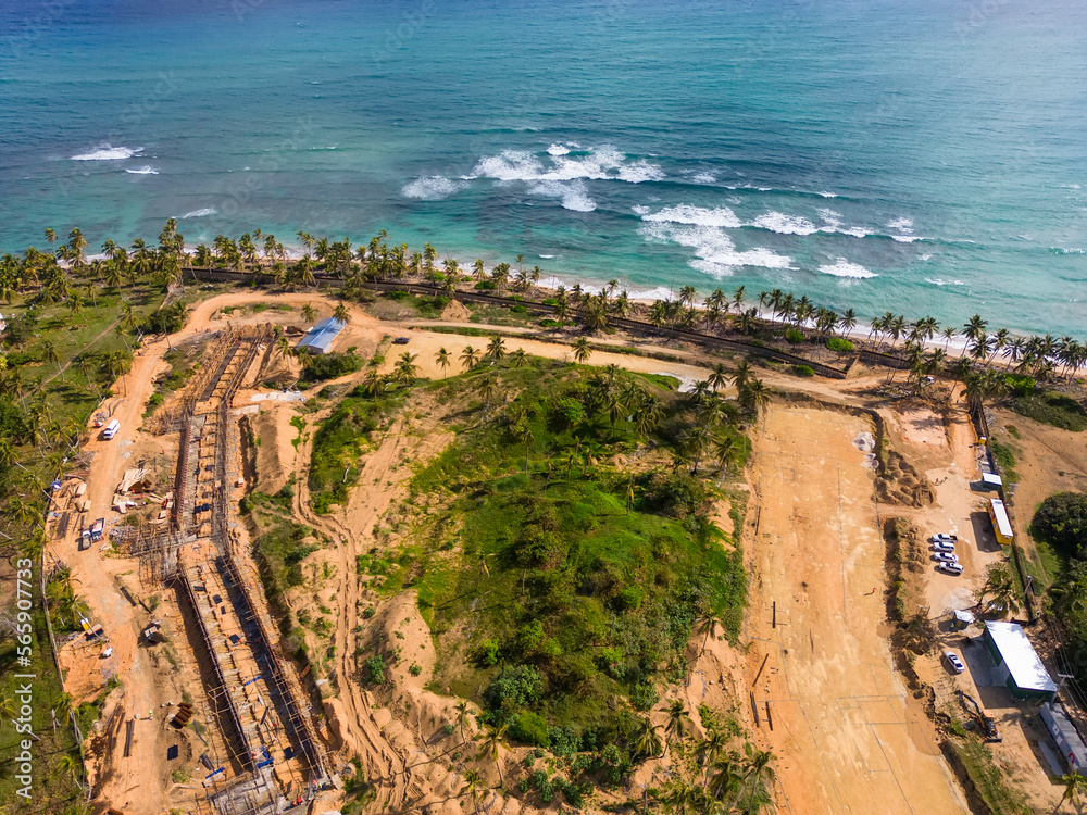 The construction site on the shore of the Caribbean sea. Start building of new all Inclusive resort on a wild tropical beach. Investing and development tourism in the Dominican Republic